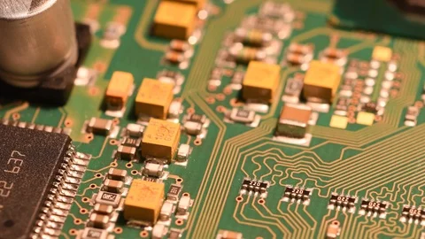 Electronic circuit board in rotation. Macro detail of printed electronic board. Stock Footage 101098877