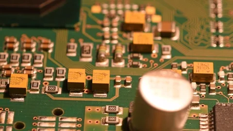 Electronic circuit board in rotation. Macro detail of printed electronic board. Stock Footage 101098935