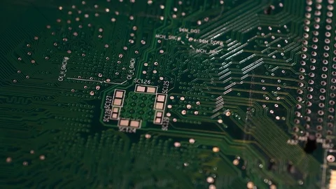 Electronic circuit board in rotation. Macro detail of printed electronic board. Stock Footage 101099796