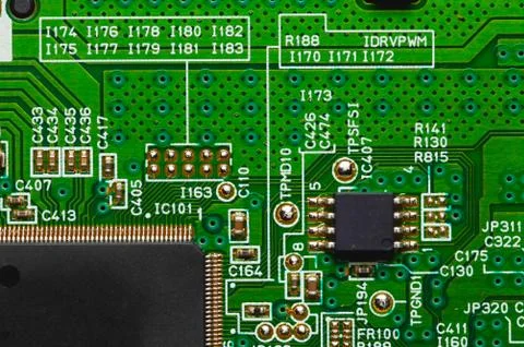 Electronic circuit close-up microchip on a green microcircuit with elements of Stock Photos