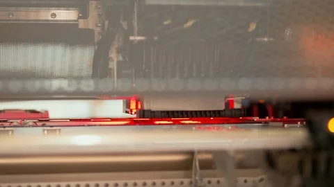 Electronic circuit in surface-mounting machine in red light Stock Footage 105245240