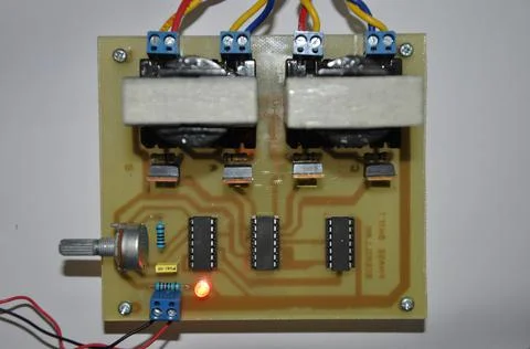 An electronic circuit of a voltage and current amplifier Stock Photos