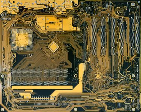 Electronic circuitsat backside of personal computer mainboard Stock Photos