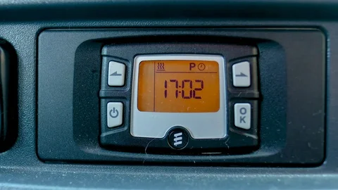 Electronic clock on the panel. automotive buttons controls. Stock Footage 118930687