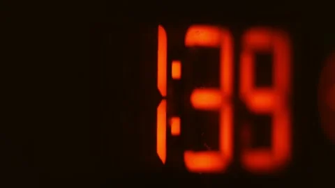 An electronic clock with red numbers counts down milliseconds on a timer. Stock Footage 271664113