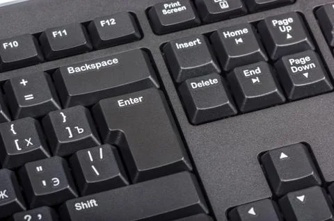 Electronic collection - black computer keyboard with key enter Stock Photos