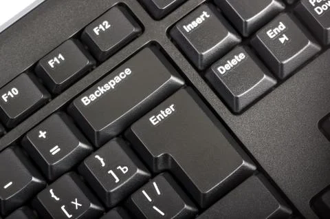 Electronic collection - black computer keyboard with key enter Stock Photos