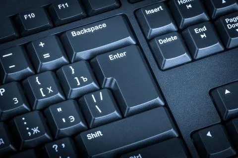 Electronic collection - black computer keyboard. The focus on the Enter ke... Stock-Fotos
