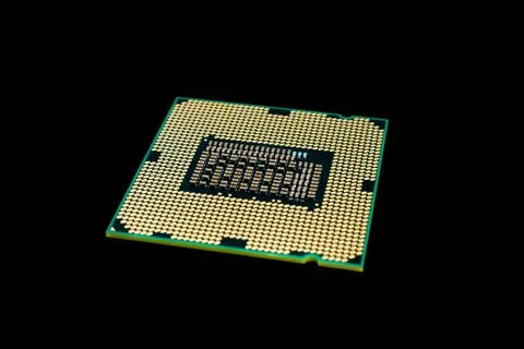 Electronic collection - Computer processor from the bottom side isolated on b Stock Photos