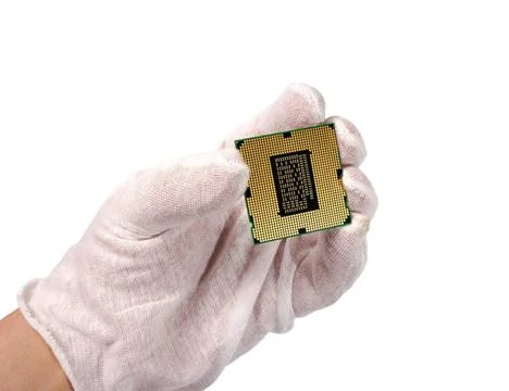 Electronic collection - Hand and computer processor isolated on white back... Foto stock