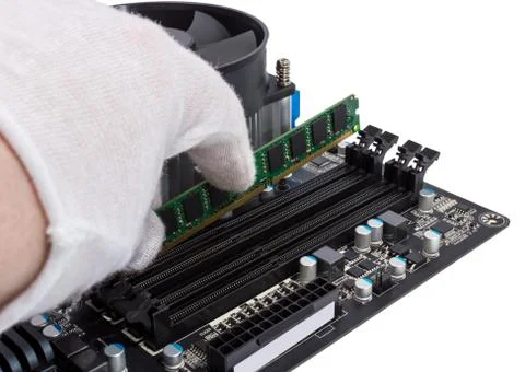 Electronic collection - Installing memory module in DIMM slot on motherboard Stock Photos
