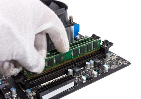Electronic collection - Installing memory module in DIMM slot on motherboard Stock Photos