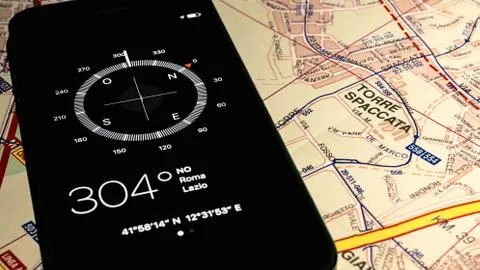 Electronic compass and map Stock Photos