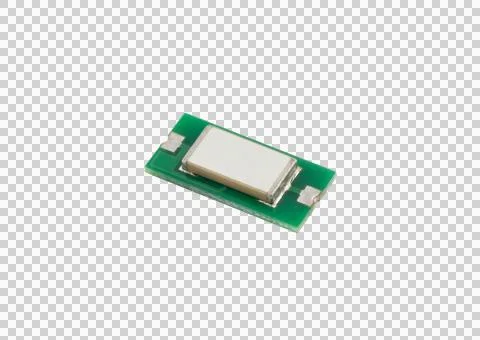 Electronic component small green circuit board with white square chip isola.. Fotos de archivo