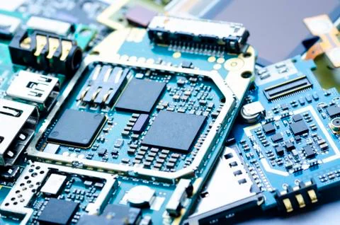 Electronic components and precious metals close-up Stock Photos