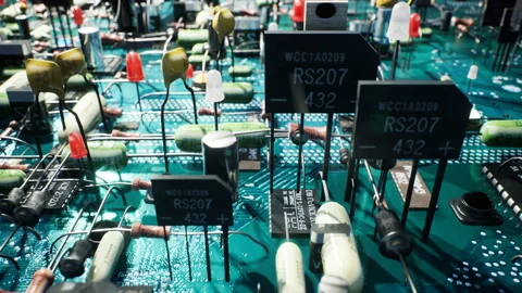 Electronic components inside a technological device: microchips, transistors Stock Footage 140935499