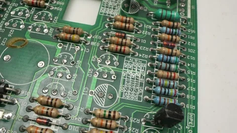 Electronic components inside a technological device: microchips, transistors Stock Footage 241314640