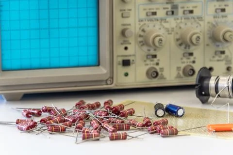 Electronic components with oscilloscope Stock Photos