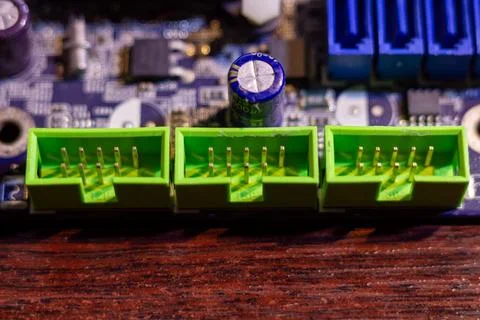 Electronic components part of hardware system with metal pins and capacitor Stock Photos
