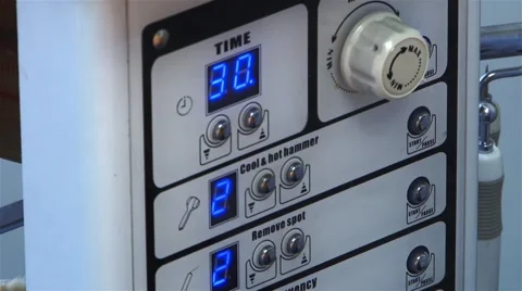 Electronic device with buttons and digital display flickering showing that Stock Footage 63389029