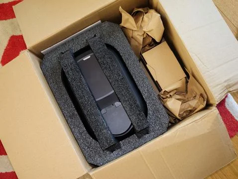 Electronic Device Unboxing with Foam Padding Stock Photos