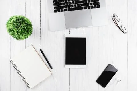 Electronic device on workspace Stock Photos