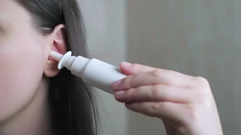 Electronic devices - automatic ear cleaning devices, home ear hygiene care for a Stock Footage 296575750