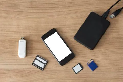 Electronic devices on a desk Stock Photos