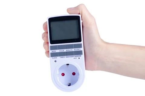 Electronic Digital Timer Switch Socket Kitchen Timer in hand Stock Photos