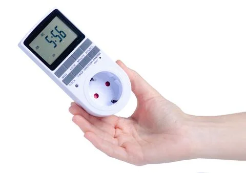 Electronic Digital Timer Switch Socket Kitchen Timer in hand Stock Photos