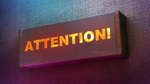 Electronic display showing red light message Attention Video stock 265069454