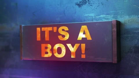 Electronic display showing red light message IT'S A BOY Stock Footage 265069629