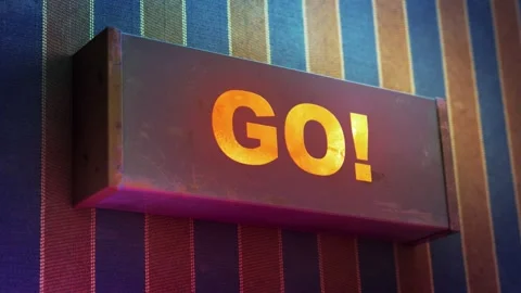 Electronic display showing red light message GO! Stock Footage 268597923