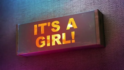 Electronic display showing red light message IT'S A GIRL! Stock Footage 268598014