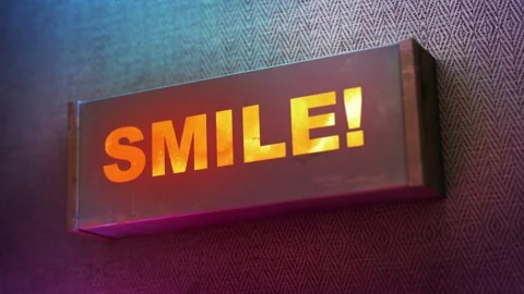 Electronic display showing red light message Smile! Stock Footage 268599910