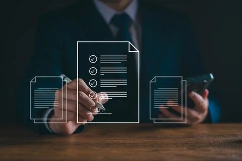 Electronic document signature concept. Document management man sign an electr Stock Photos