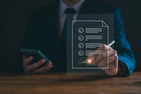 Electronic document signature concept. Document management man sign an electr Stock Photos