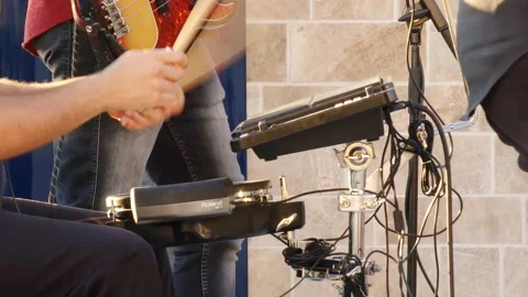 Electronic drum kit - hand of caucasian male musician in a rock band playing Stock Footage 231034427