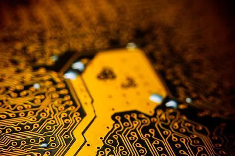 Electronic gold computer circuit blur Stock Photos