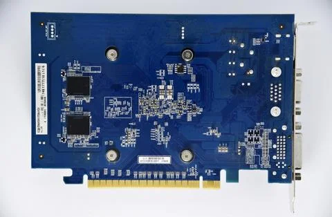 Electronic graphics card board with chips and radio elements. The reverse s.. Stock Photos
