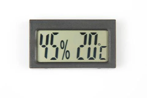 Electronic humidity meter and temperature on white background Stock Photos