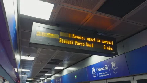 Electronic information display board at Tre Torri station on Milan M5 line Stock Footage 336909837