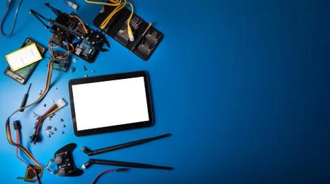 Electronic items and digital tablet with blank screen on blue background with 스톡 사진