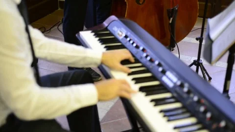 Electronic keyboard player Stock Footage 82295174