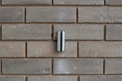 Electronic keycard reader on a brick wall Stock Photos