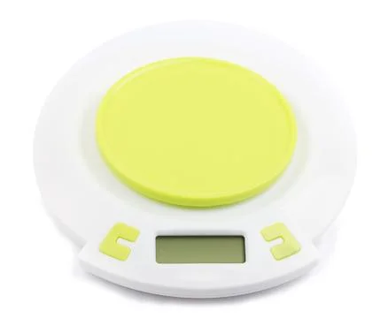 Electronic kitchen scale with green stand Stock Photos