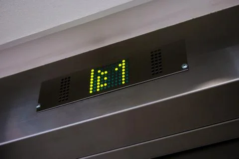 Electronic LCD elevator display with floor number one Stock Photos