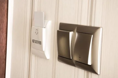 Electronic lock with card inserted in a hotel room Stock Photos