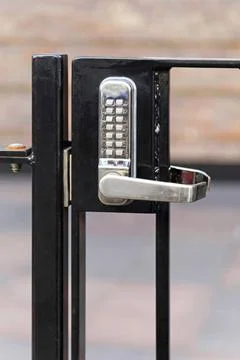 Electronic lock Electronic lock with pin code at fence Copyright: xZoonar.... Stock Photos