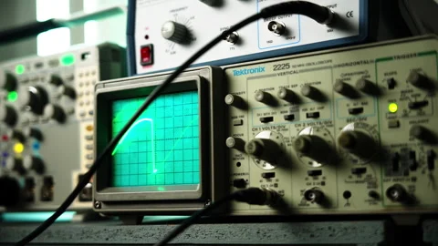Electronic machine displaying sign wave in lab classroom Stock Footage 248796289